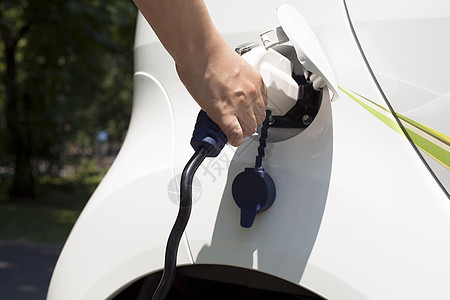 电动汽车充电方式电源电源线喷嘴人手收费插头汽车工业马达电动车图片