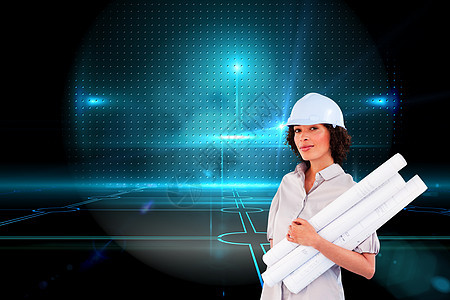自信女性持有施工计划的综合形象建筑师女性蓝图头发计算快乐计算机安全帽绘图蓝色图片