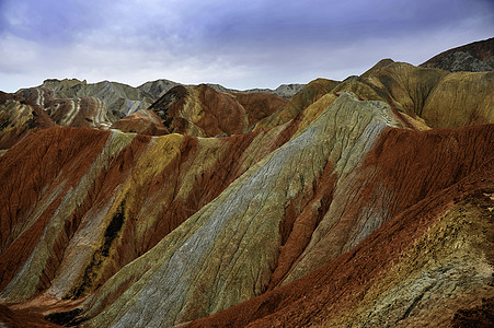 张掖七彩丹霞达克夏山丹霞砂岩蓝色红色岩石公园旅行地貌天空橙子背景