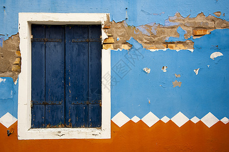 色彩多彩的格伦墙蓝色窗户橙子街道建筑石头旅行砂岩画报建筑学图片