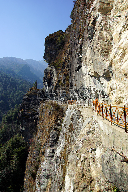 中国云南省达利市康山山探险小路冰川全景阳光旅游游客晴天远足高山荒野图片