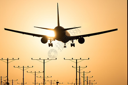 洛杉矶机场飞行摄影橙子天空着陆交通阳光飞机场太阳运输图片
