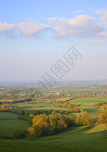 英格兰 牧农农村丘陵阳光场景地平线风景农田晴天季节英语场地图片