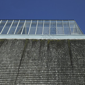 有玻璃屋顶的建筑物苔藓蓝色现代性天空边缘色调天窗建筑学耐用性线条图片