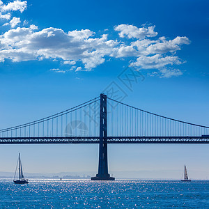 来自加利福尼亚州7号码头的旧金山湾桥帆船假期建筑学旅行海洋蓝色景观天际地标航行城市图片