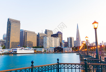 加利福尼亚州旧金山码头7日落市中心蓝色旅行摩天大楼城市建筑物地标海洋天空景观图片