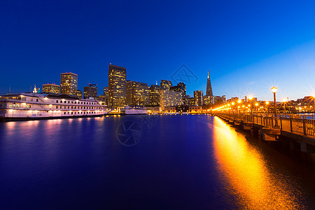 加利福尼亚州旧金山码头7日落海洋旅行市中心摩天大楼建筑物假期建筑学天空城市蓝色图片