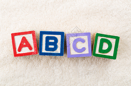 ABCD 玩具块阅读积木游戏孩子们毯子立方体木头乐趣玩具正方形图片