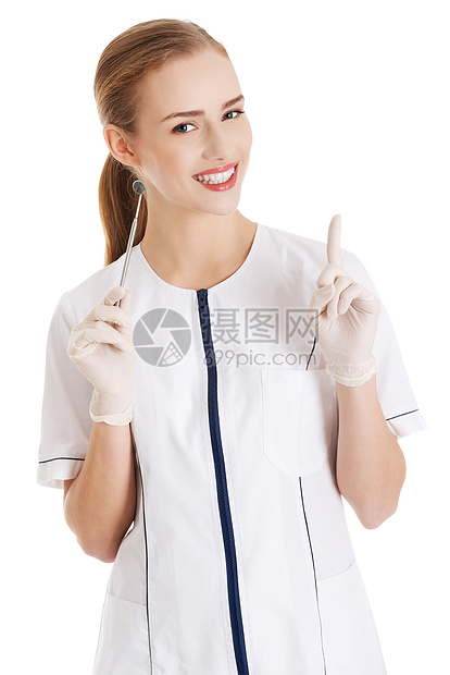 年轻的有装备的年轻美丽的牙医女工作程序检查医生女士临床工具治疗牙科诊所图片