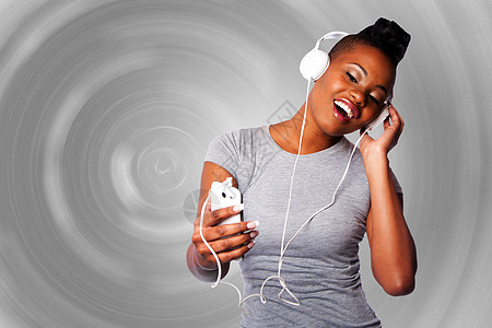 听音乐的漂亮女人啊白色玩家灰色耳机音乐乐趣技术音乐播放器女性青少年图片