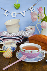 茶和蛋糕花朵时间杯子生日心形餐巾咖啡丝带郁金香骨瓷图片