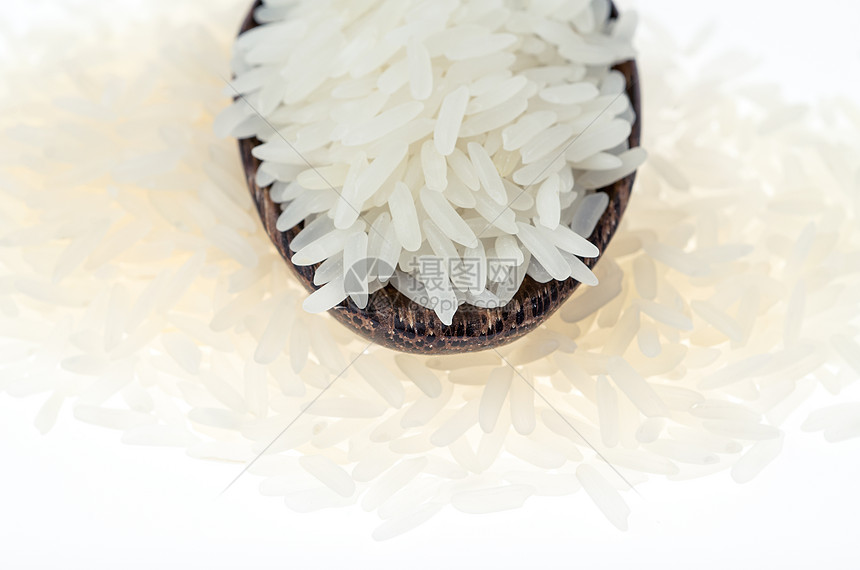 白背景的木勺米稻谷茶点食物纹理种子厨房静物干货用具饮食白米图片