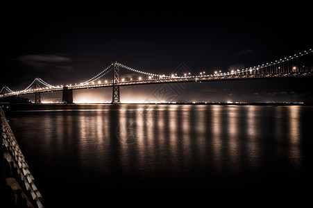 夜间湾桥路灯国际风光地标水平摄影穿越旅游运输反射图片