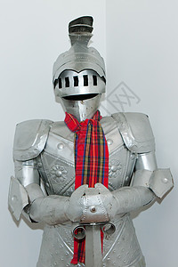 中世纪骑士的盔甲和头盔西装灰色套装力量金属防御围巾胸甲板甲图片