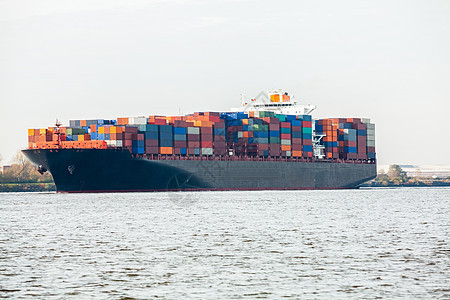 完全装满集装箱的港口集装箱船舶输送出口海洋船运码头海港容器化货运贸易贮存图片
