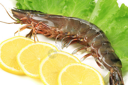 盘子里有生虎虾午餐贝类老虎柠檬海鲜养殖饮食营养甲壳沙拉图片