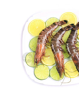 盘子里有生虎虾甲壳贝类美食绿色白色黄色饮食养殖柠檬动物图片