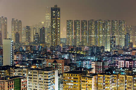 夜间在香港的住宅楼都市天际建筑贫民窟场景风景景观公寓市中心摩天大楼图片