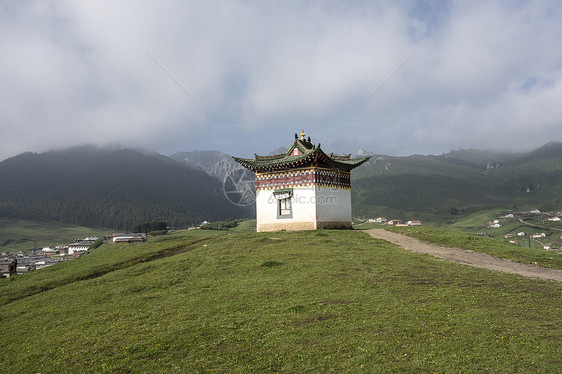 藏藏建筑场景地球房子风景薄雾佛教徒高地草地宗教阳光图片