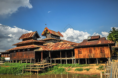 缅甸掸邦内莱湖男人农民日落渔夫平衡热带贫困独木舟农村技术图片