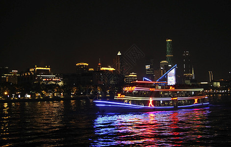 夜里在珍珠河上行驶的船中心运动风景流动地标场景巡航城市天际交通运输图片