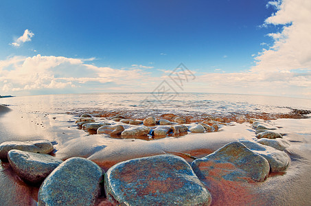 湿岩石波纹海洋碎石海浪环境天空鹅卵石巨石火花矿物图片