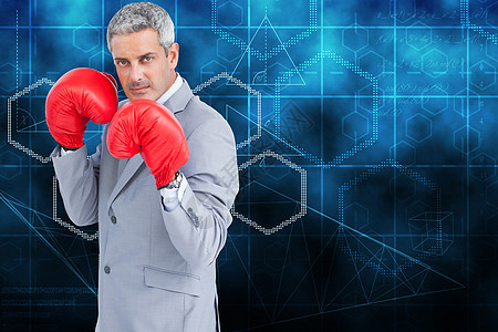 具有拳击手套的强硬商务人士综合形象男人快乐微笑商务衬衫公司头发计算机红色技术图片