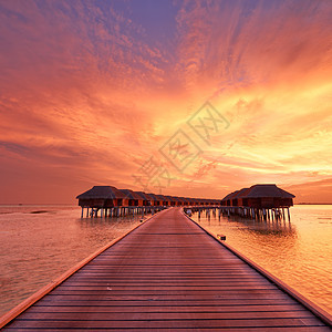 马尔代夫海滩日落海岸线海滩码头别墅海洋房子旅行假期日出酒店图片