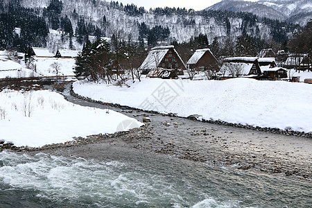 白雪背景白川去村小屋农场瀑布茅草建筑学房子住宅松树运河历史村庄背景