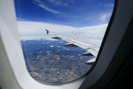 透过窗口飞机查看情况喷射窗户航空气氛水平多云灰色旅行玻璃空气图片