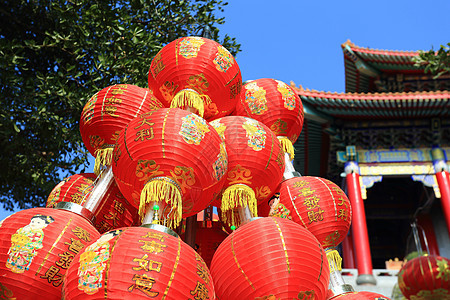 在新年节日的中国灯笼装饰传统佛教徒装饰品繁荣祷告辉光运气宗教风格背景图片