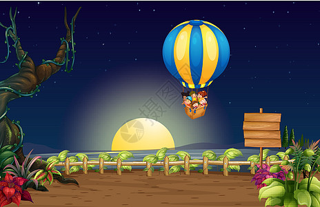 半夜的热气球在空中飞翔图片