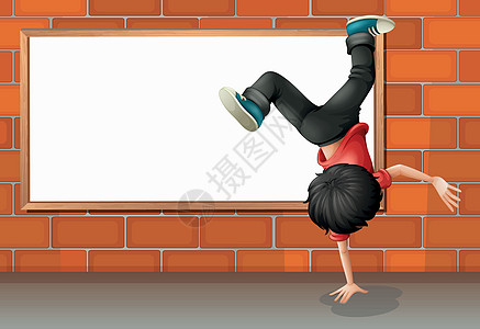 一个男孩在空板前跳起舞图片