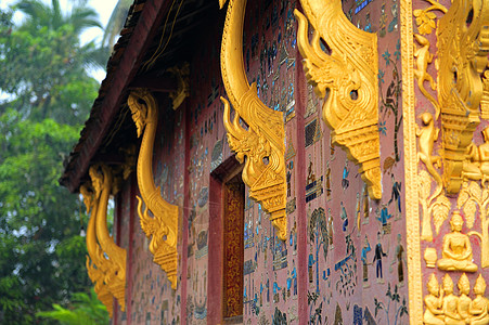 琅勃拉邦标志金叶子建筑马赛克细节警告文化宗教金子地方图片