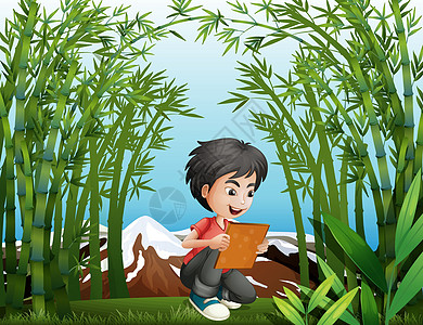 一个男孩在雨林里拿着框架图片