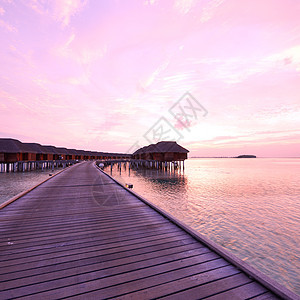 马尔代夫海滩日落日出码头海洋房子蓝色别墅阳光天空海景海滩图片