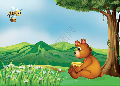 一只熊坐在树旁图片