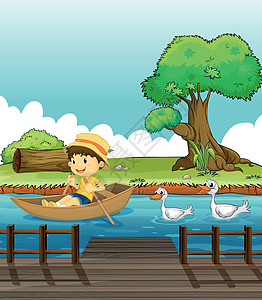 一个男孩在船上骑着一只小鸭子图片
