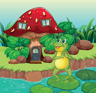 一只青蛙站在红蘑菇屋附近图片