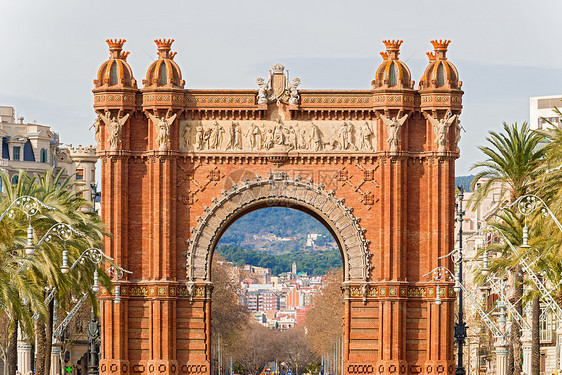 西班牙巴塞罗纳的胜利拱门日光石刻石头旅游目的地地方场景城市红砖图片