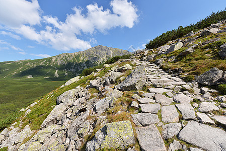 塔塔山区爬坡高地公园旅游草地假期生态天空红峰场景图片