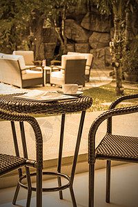 咖啡餐厅椅子假期酒店桌子报纸杯子阳台建筑咖啡店背景图片