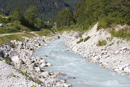 斯洛文尼亚索卡河流动森林天空荒野阳光旅行溪流石头岩石蓝色图片