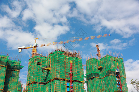 绿色建造建造起重机建筑建筑学活动蓝色框架黄色城市绿色工作安全建筑物背景