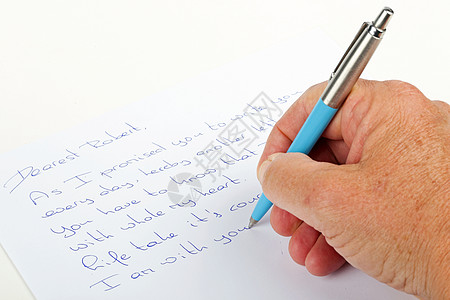 用笔在纸上写情话高清图片