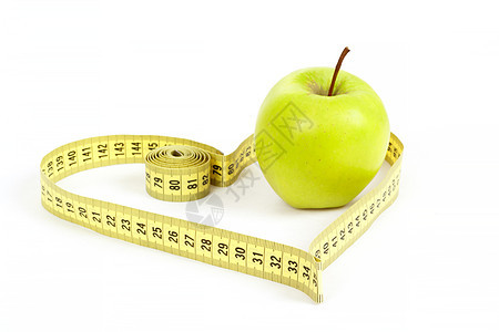 绿色苹果 有测量磁带和心脏符号 孤立饮食损失营养仪表午餐减肥活力食物水果早餐图片