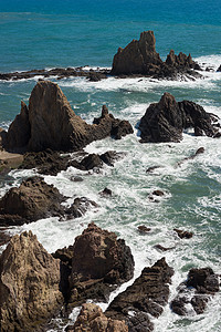 阿尔梅里亚落岩海岸火山自然公园波浪断路器岩石背景