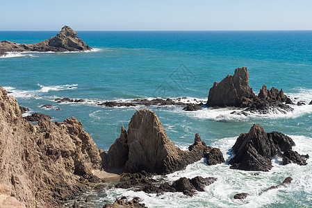 阿尔梅里亚落岩海岸波浪火山水平岩石自然公园断路器背景