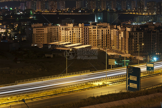 夜间交通驾驶风光车道头灯运动尾灯未来派技术方式城市图片