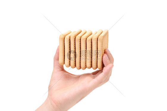 手握着盐碱苏打饼干木桩饼干食物赌注小麦美食宏观盐渍长方形面包正方形图片